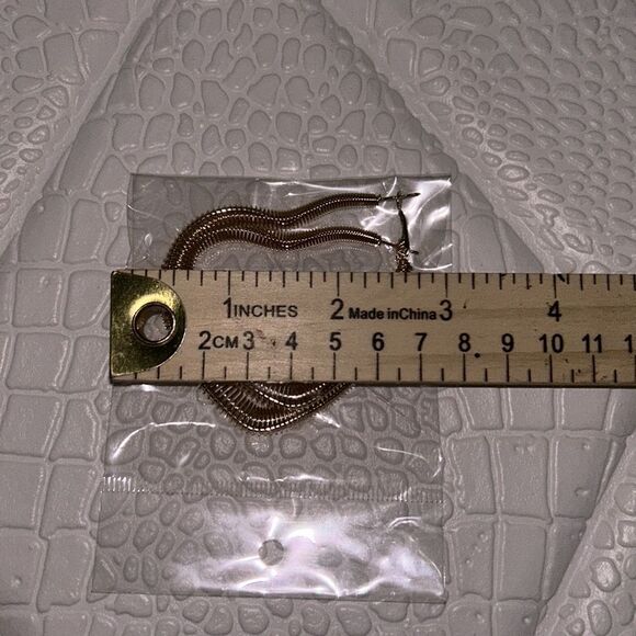 Large Gold-Tone Heart Shaped Hoop Earrings - Picture 3 of 4